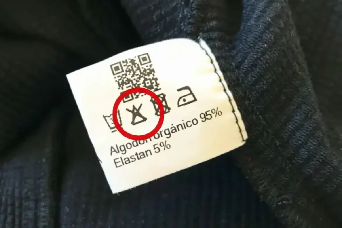 Kaj pomeni trikotnik s "X" na etiketi oblačil: vse, kar morate vedeti